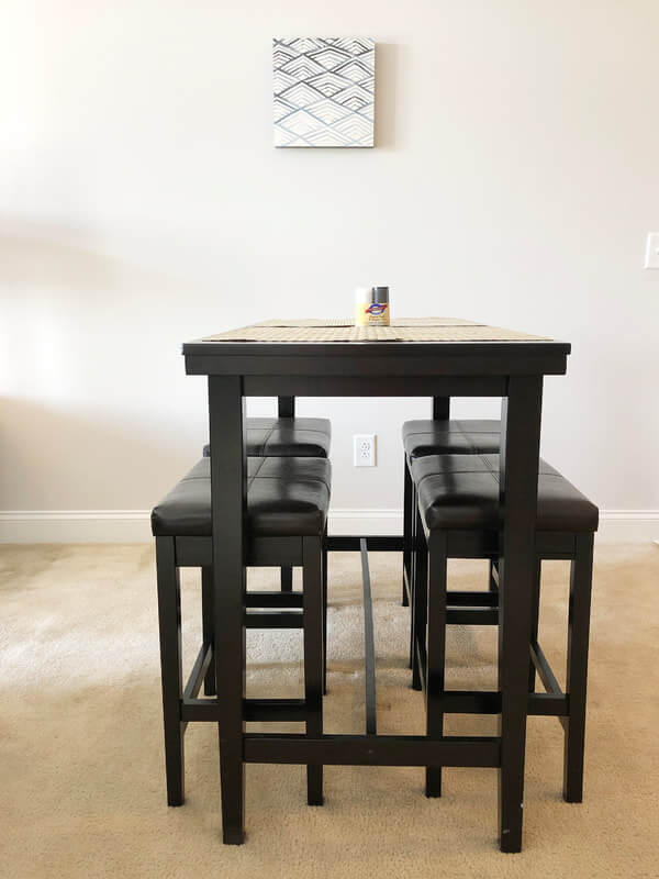 Black Table with Black Bench chairs for lease